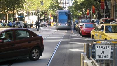 Trams vs traffic in Collins Street