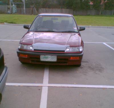 Car parked across lines