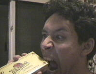 [Eating Whitmans chocolates]